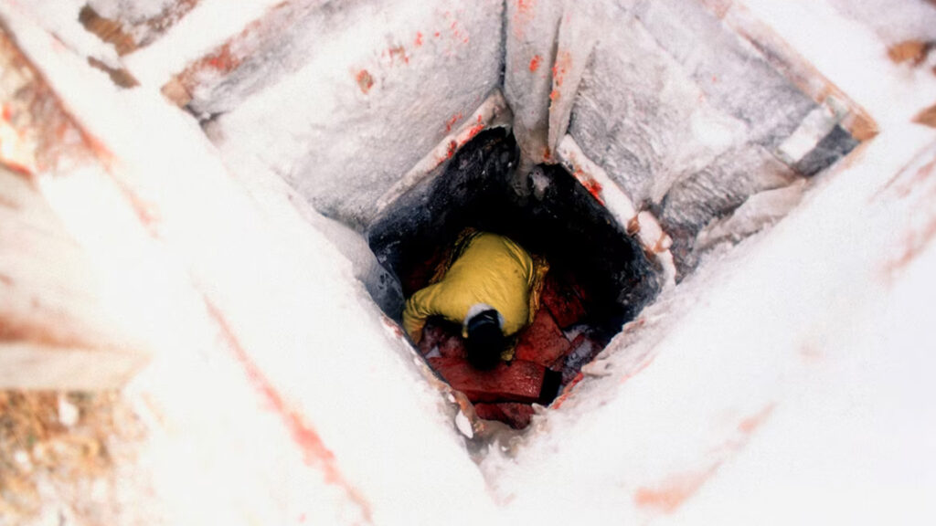person in ice cellar
